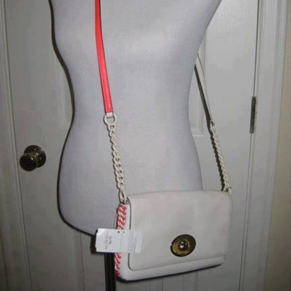 NWT-Coach crossbody bag with neon pink accents Orig. $300